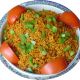 Jollof Rice with Chicken, Gizzard + Mixed Veggies